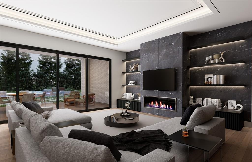 591 Decoupage Drive Fairburn, GA 30213 - Photo 31 of 34 a living room with furniture and a flat screen tv