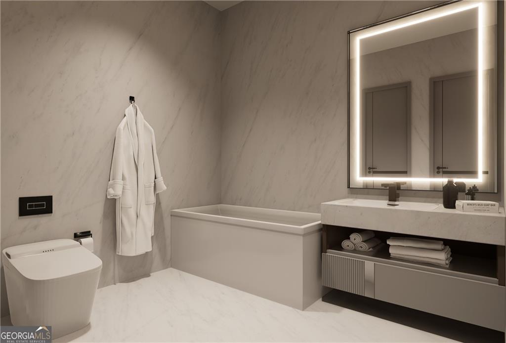 591 Decoupage Drive Fairburn, GA 30213 - Photo 9 of 34 a bathroom with a sink a toilet and a mirror