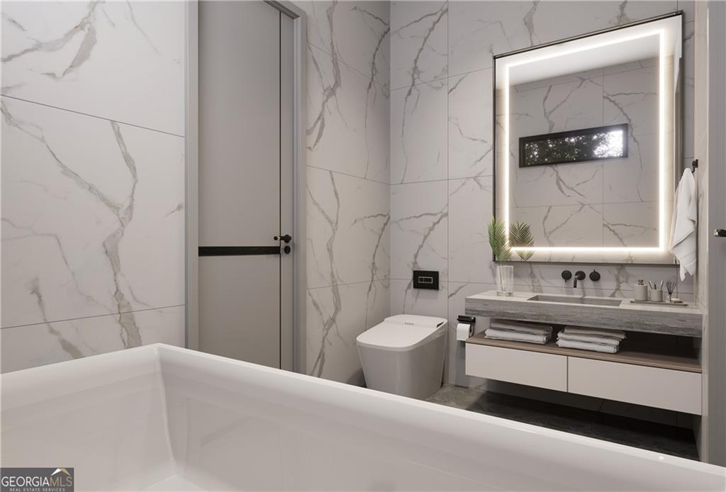 591 Decoupage Drive Fairburn, GA 30213 - Photo 10 of 34 a bathroom with a double vanity sink toilet and shower