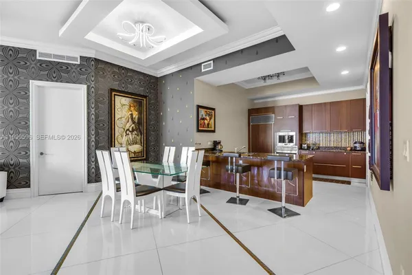 a living room with furniture and a table
