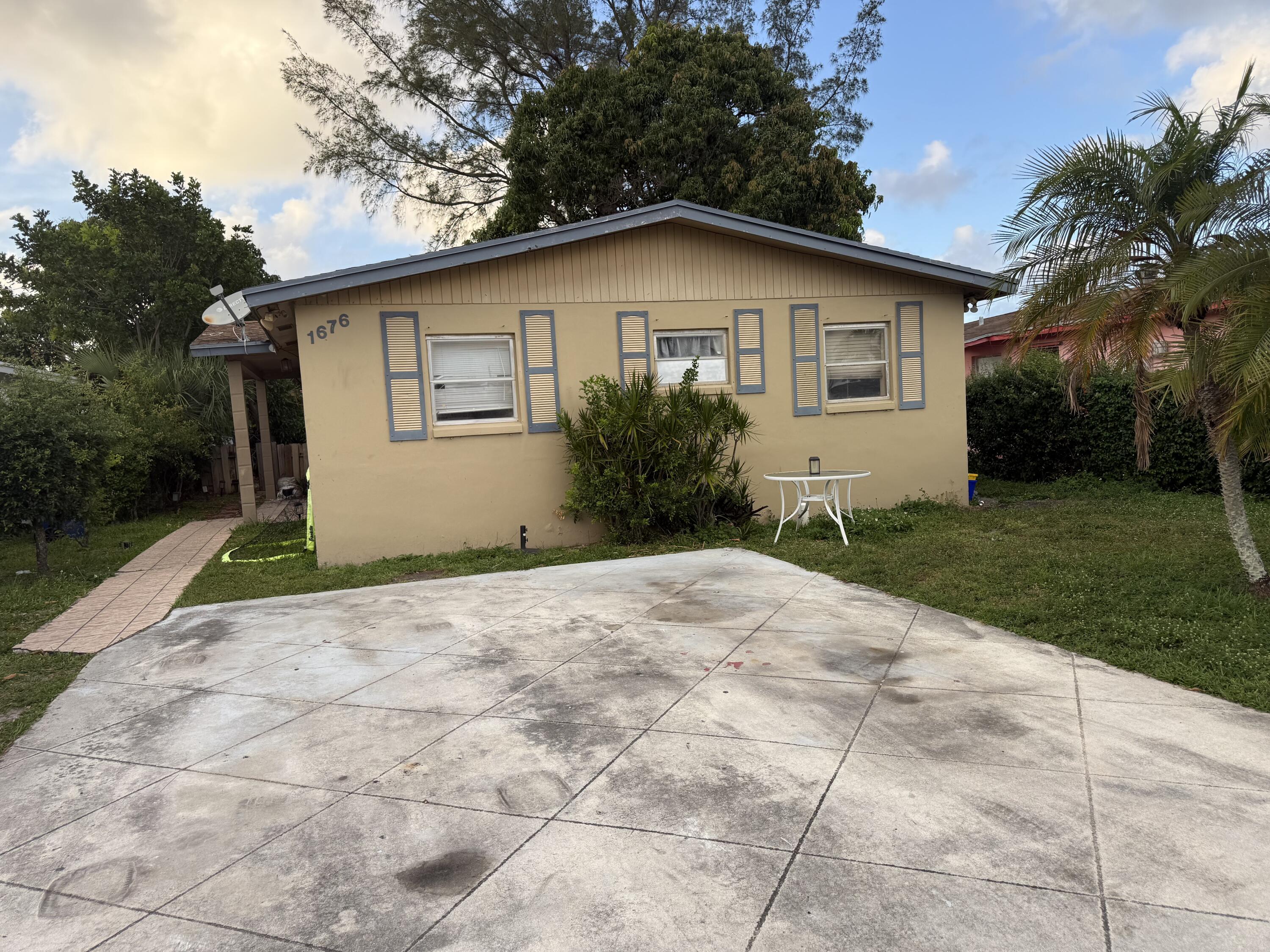 1676 West 10th Street Riviera Beach, FL 33404 - Photo 1 of 13 IMG_0812