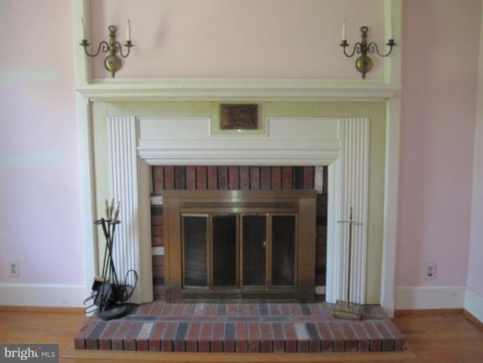 4815 Clermont Mill Road Pylesville, MD 21132 - Photo 18 of 25 fireplace in bedroom