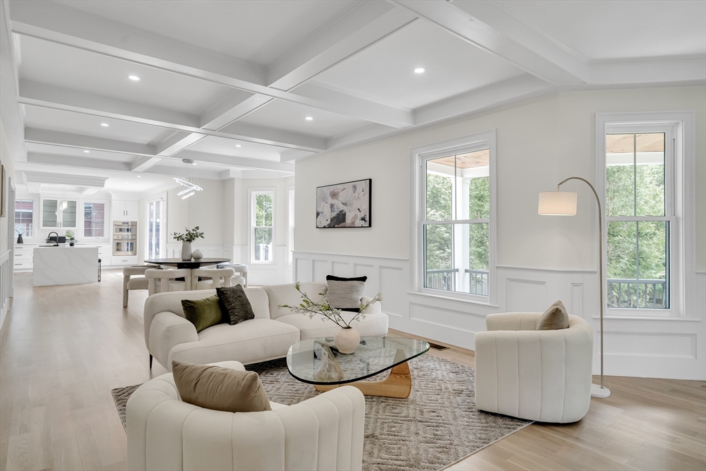 686 Centre Street Newton, MA 02458 - Photo 3 of 26 a living room with furniture and a large window
