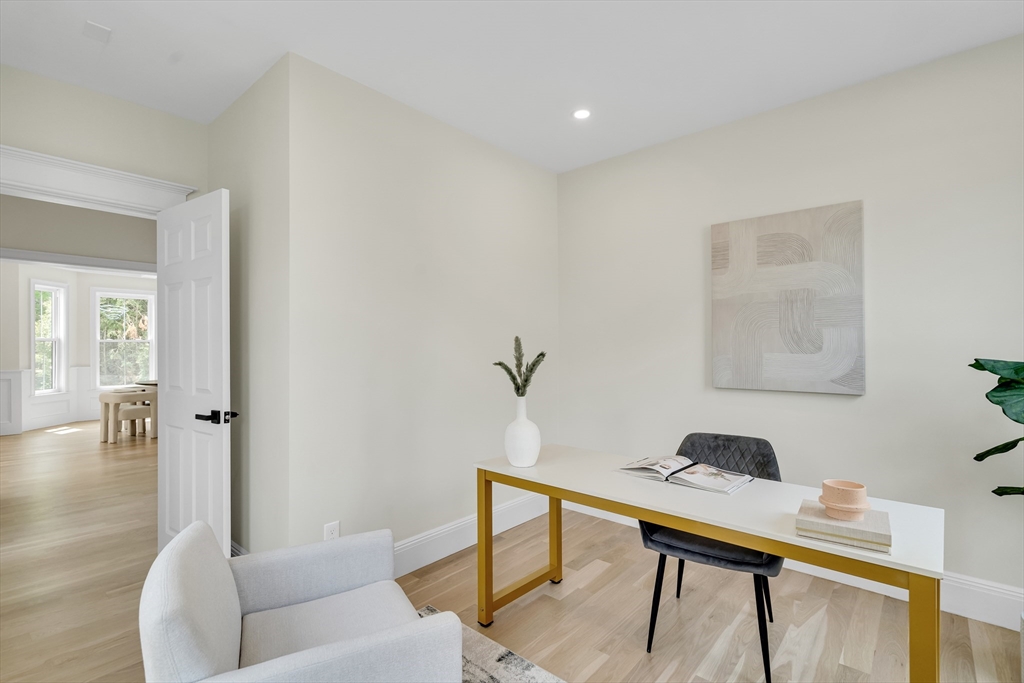 686 Centre Street Newton, MA 02458 - Photo 6 of 26 a living room with furniture and a wooden floor