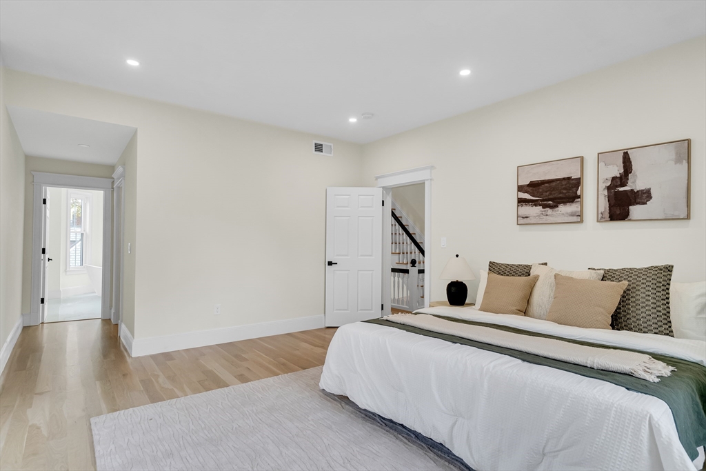 686 Centre Street Newton, MA 02458 - Photo 9 of 26 a bedroom with bed and tv