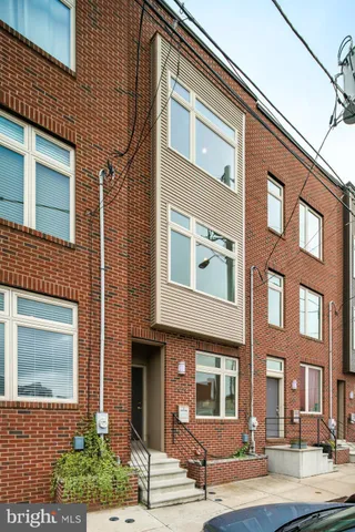 a front view of a brick building