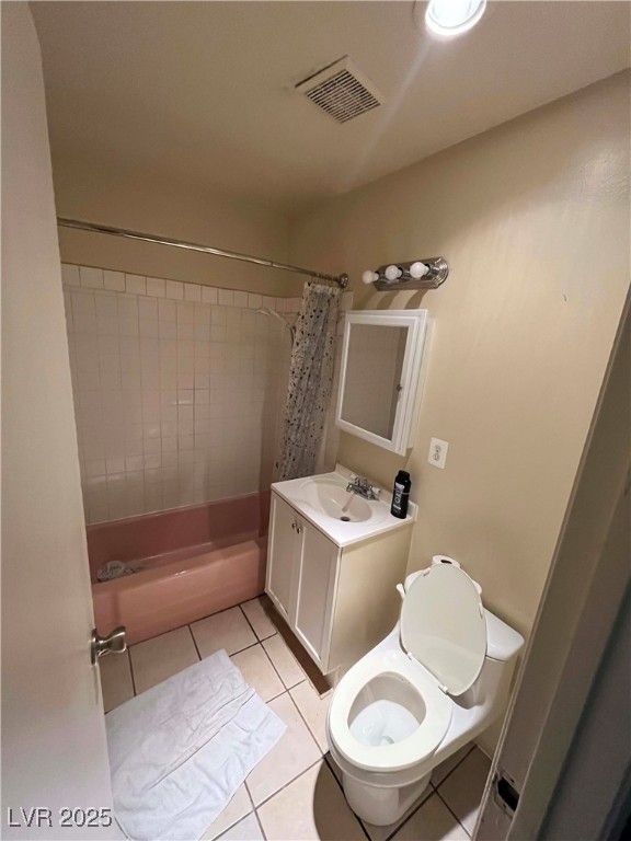 1388 East Desert Inn Road, Unit 2(ROOM A) Las Vegas, NV 89169 - Photo 8 of 13 Bathroom with tile patterned floors, vanity, toile