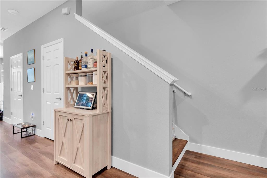 5233 Sylvester Loop Tampa, FL 33610 - Photo 13 of 36 a view of entryway with wooden floor