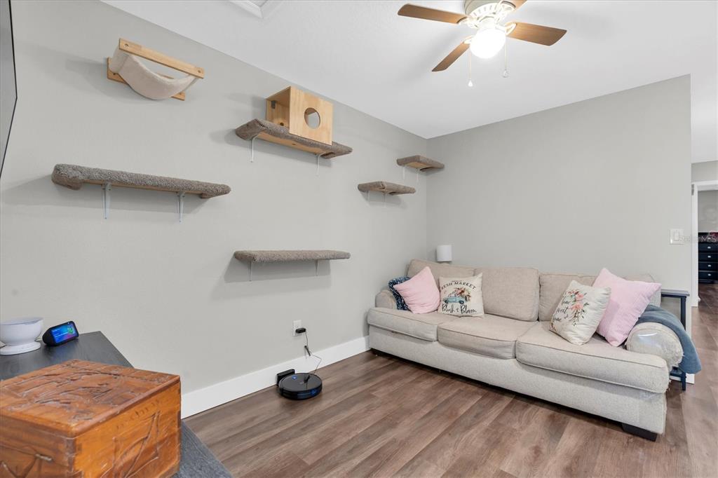 5233 Sylvester Loop Tampa, FL 33610 - Photo 19 of 36 a living room with furniture and a couch