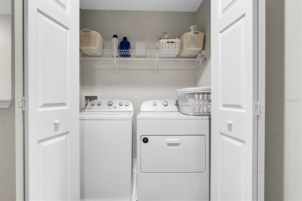 5233 Sylvester Loop Tampa, FL 33610 - Photo 23 of 36 a utility room with dryer and washer