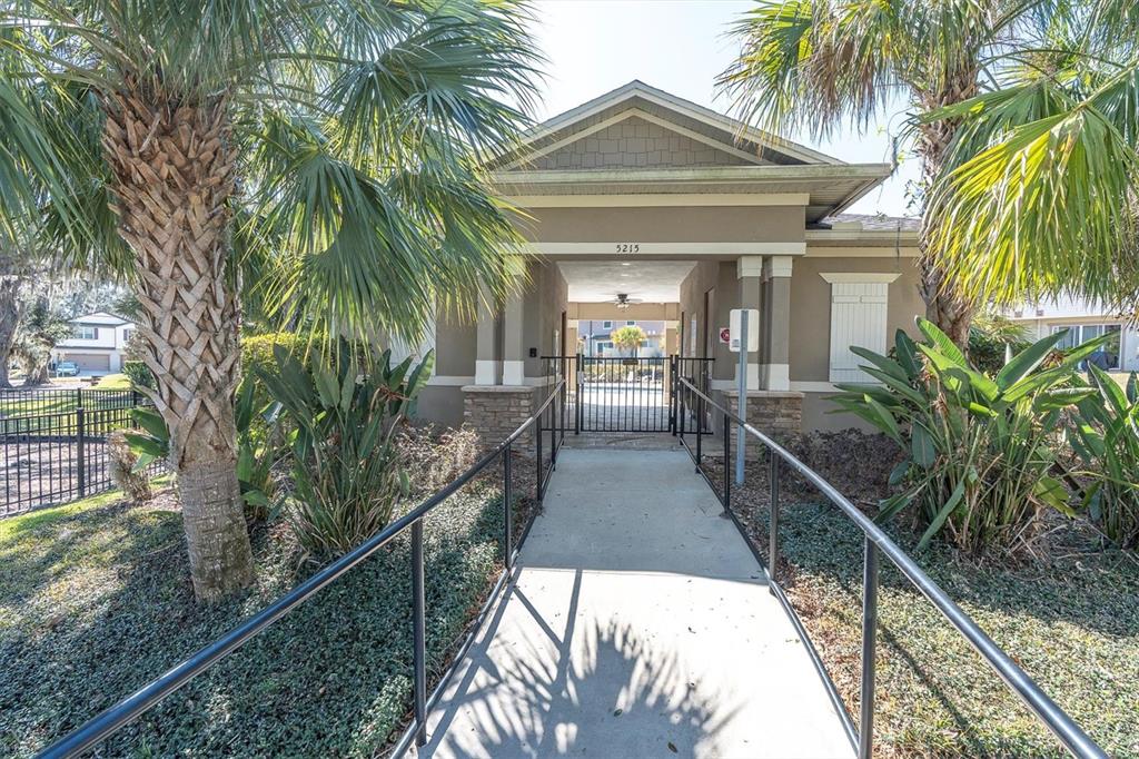 5233 Sylvester Loop Tampa, FL 33610 - Photo 29 of 36 a view of a house with a yard