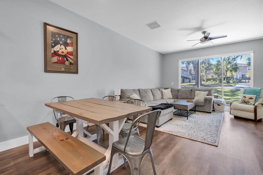 5233 Sylvester Loop Tampa, FL 33610 - Photo 7 of 36 a living room with furniture and a large window