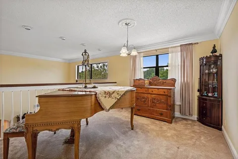 a living room with furniture and window