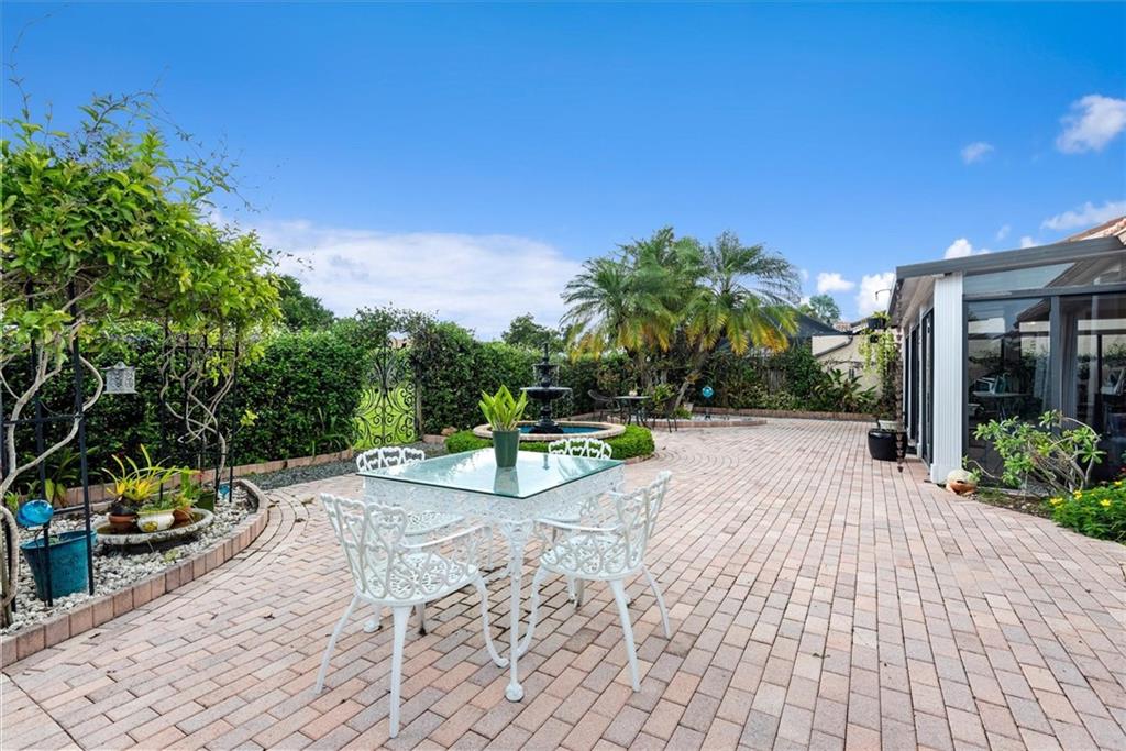 8680 Eagle Run Drive Boca Raton, FL 33434 - Photo 23 of 34 a view of a backyard