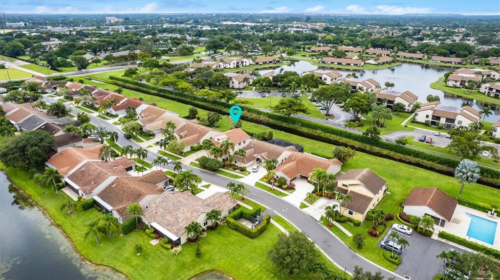 8680 Eagle Run Drive Boca Raton, FL 33434 - Photo 31 of 34 an aerial view of a city with lots of residential buildings