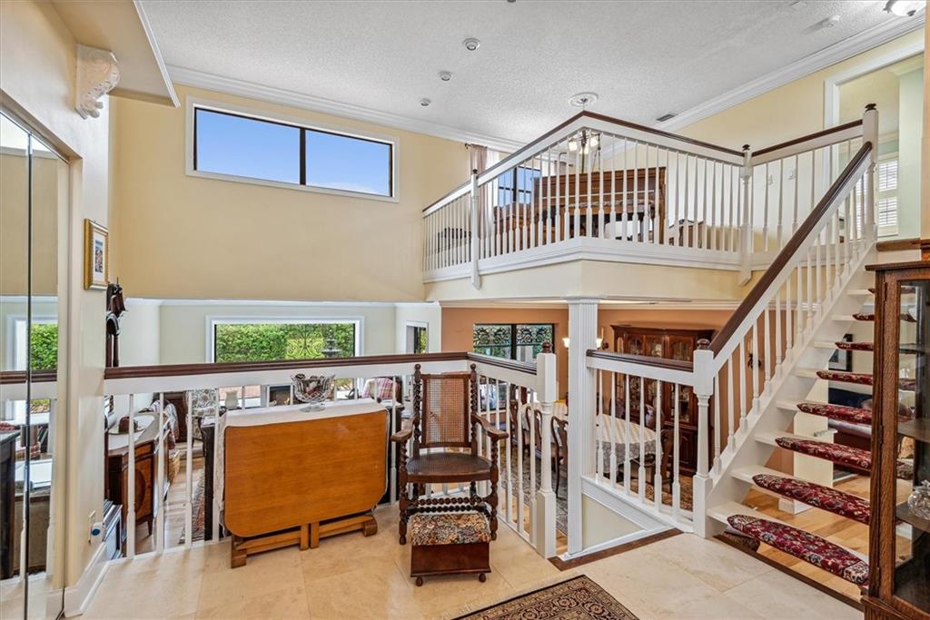 8680 Eagle Run Drive Boca Raton, FL 33434 - Photo 6 of 34 a bedroom with furniture and a window