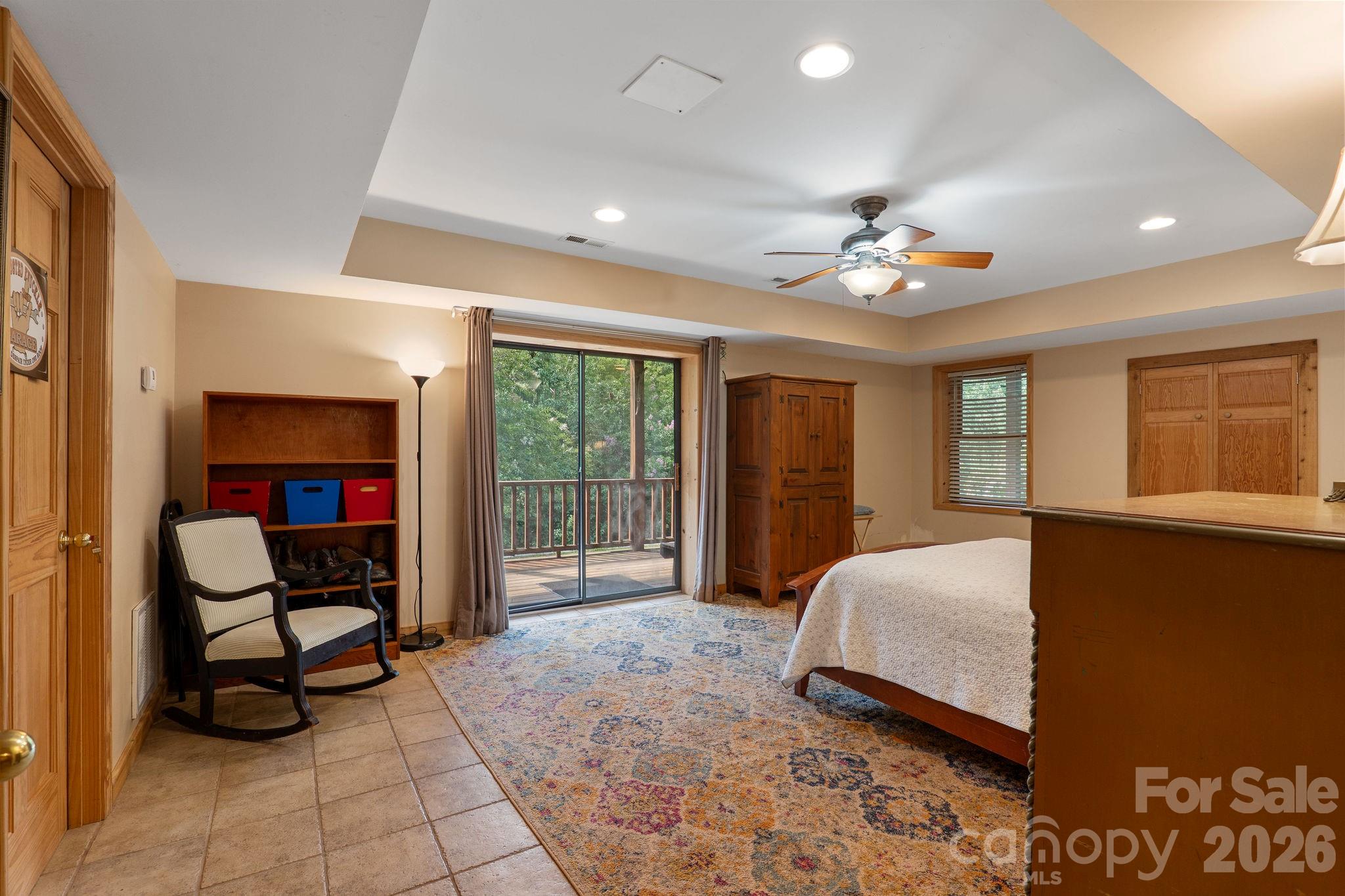 150 Avondale Ridge Road Asheville, NC 28803 - Photo 39 of 45 a bed room with a bed and a window