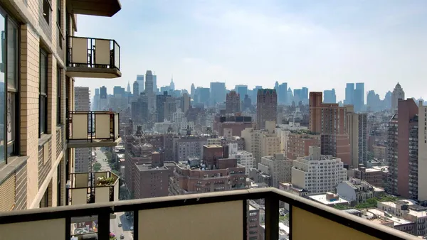 a view of a city from a balcony