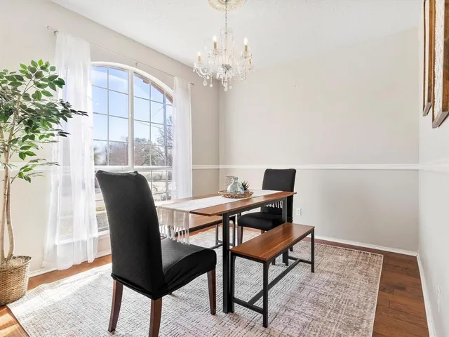 a workspace with furniture and a potted plant