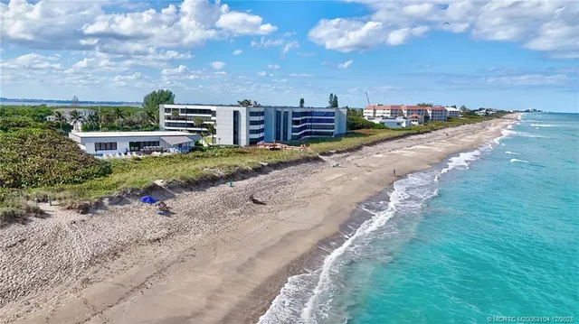 an aerial view of residential house with outdoor space