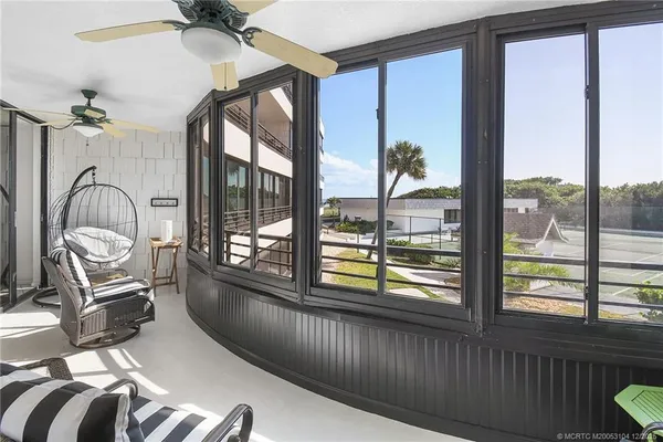 a bathroom with a double vanity sink a mirror and a shower