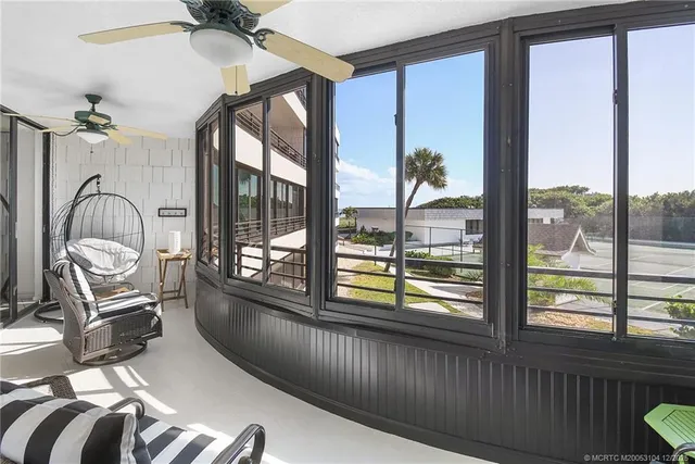 a bathroom with a double vanity sink a mirror and a shower