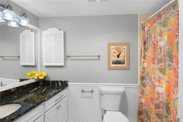 a view of a workspace with furniture and a couch