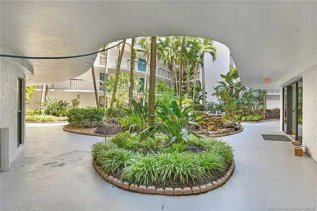 a vase of flowers sitting on a table