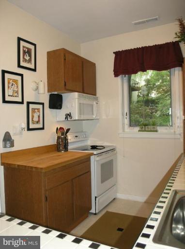 11462 Orchard Lane Reston, VA 20190 - Photo 27 of 30 GALLEY KITCHEN