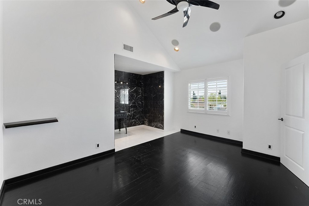 13036 Springarden Lane Westminster, CA 92683 - Photo 22 of 41 wooden floor in an empty room with a window