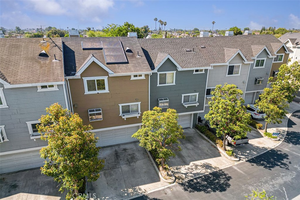 13036 Springarden Lane Westminster, CA 92683 - Photo 31 of 41 an aerial view of a house with a yard and a large tree