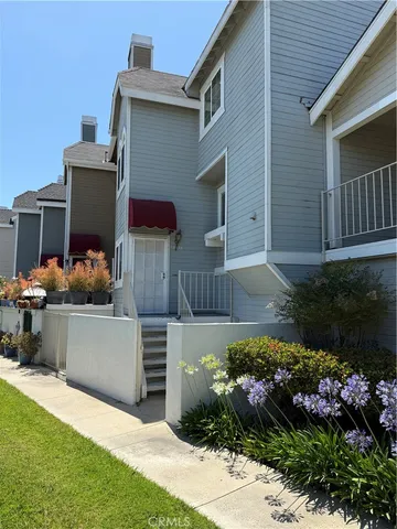 a front view of house with a yard