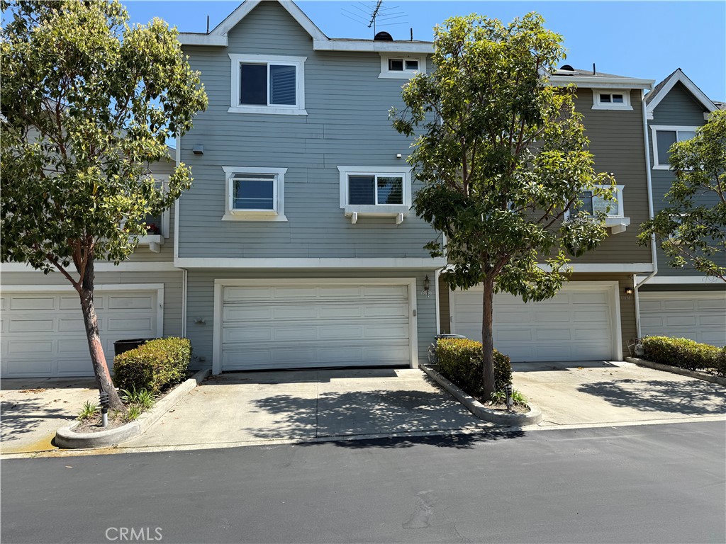 13036 Springarden Lane Westminster, CA 92683 - Photo 5 of 41 a front view of a house with a yard