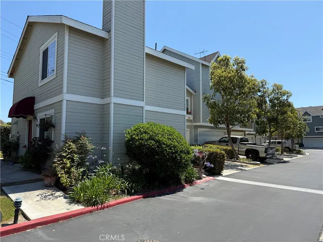 a view of a house with a street