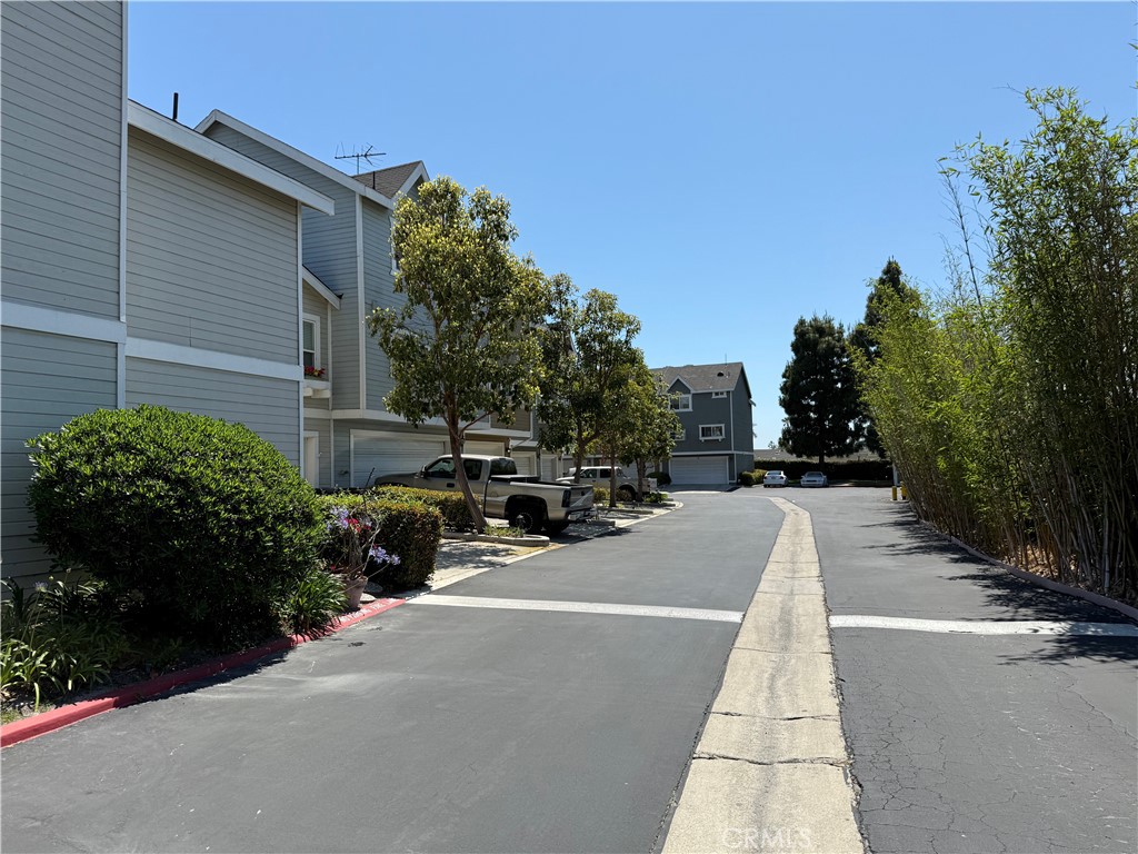 13036 Springarden Lane Westminster, CA 92683 - Photo 8 of 41 a view of a patio with table and chairs and potted plants