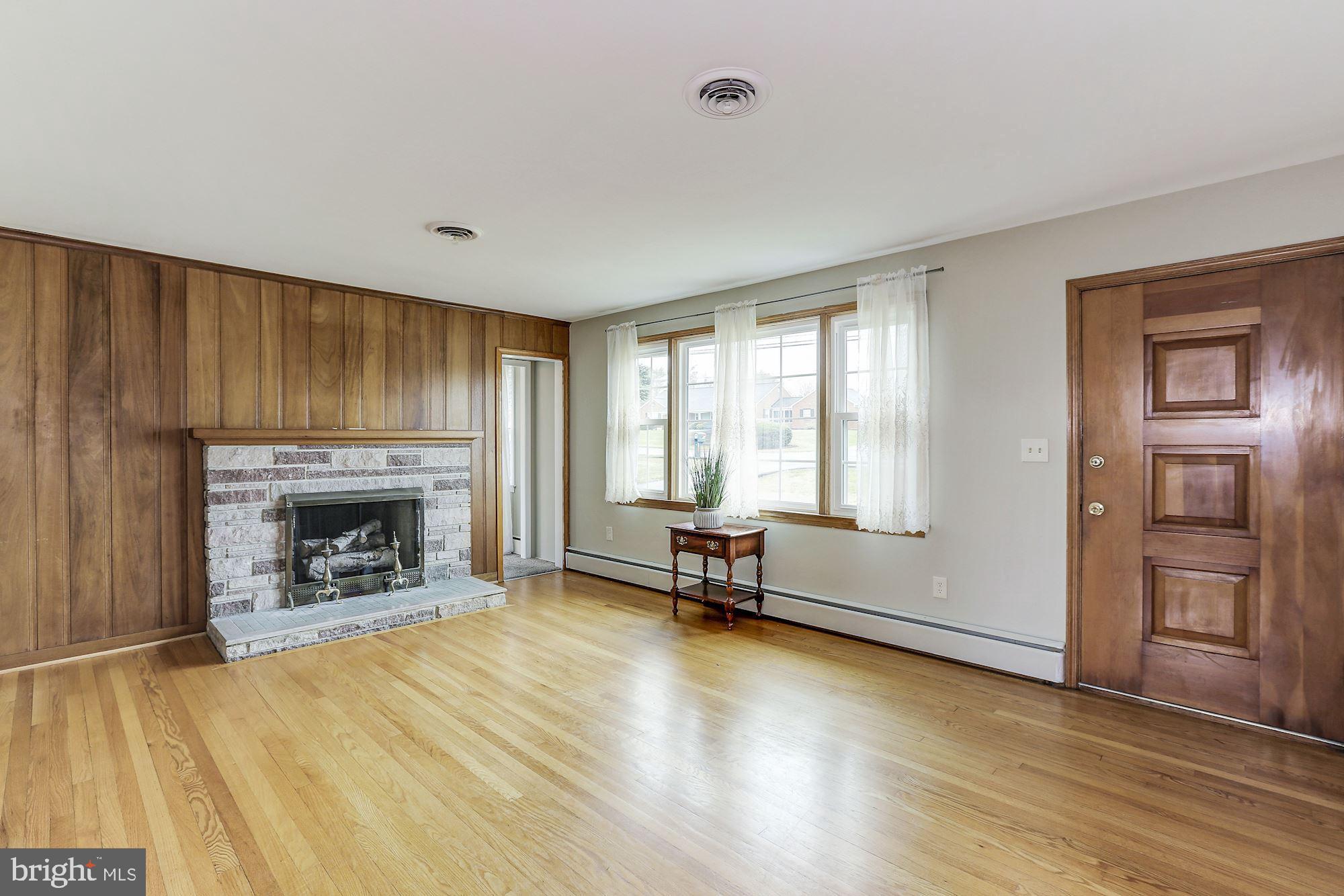 27237 Ridge Road Damascus, MD 20872 - Photo 16 of 43 Spacious Living Room & Front Entrance