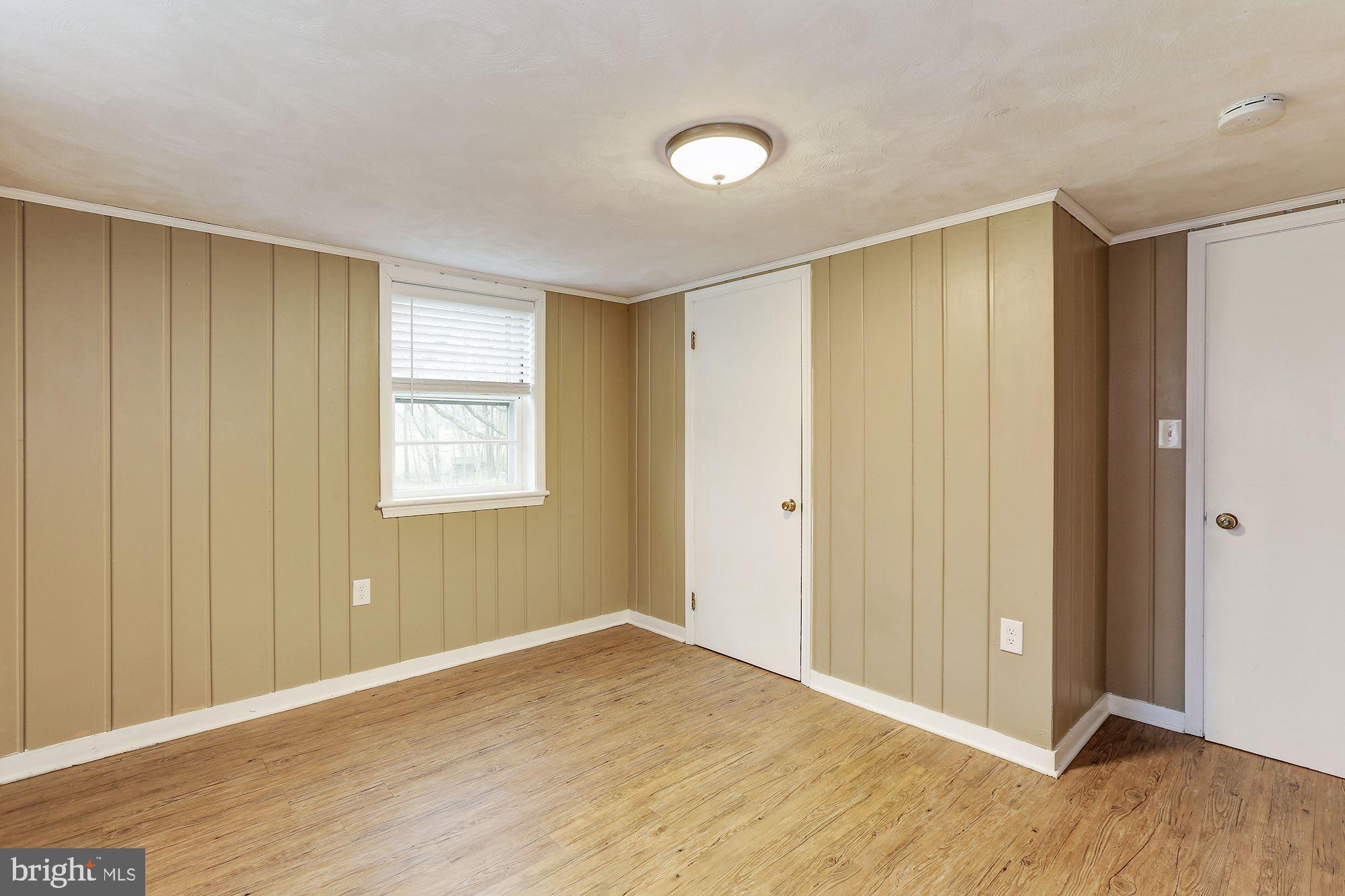 27237 Ridge Road Damascus, MD 20872 - Photo 33 of 43 Lower Level Bedroom with Cedar Closet