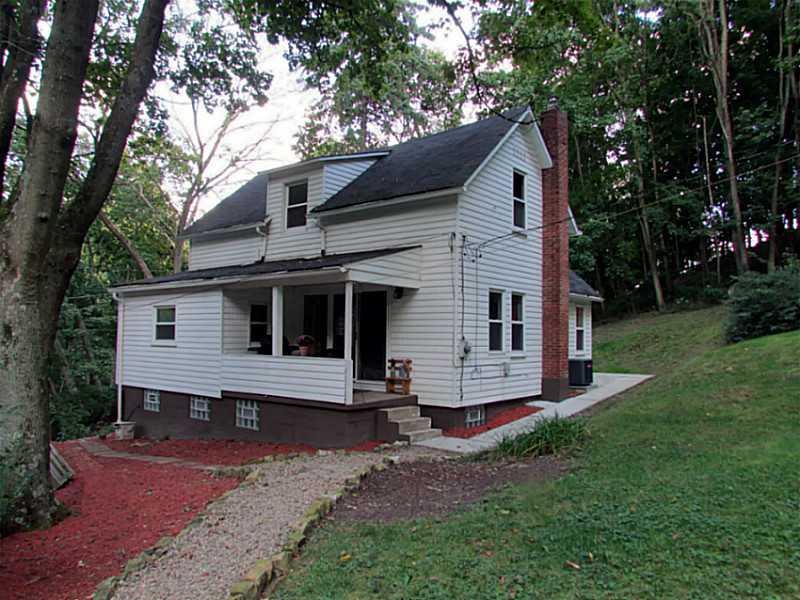 167 Poplar Street McKees Rocks, PA 15136 - Photo 2 of 22 Exterior Back. Covered porch looks out over the private back yard.