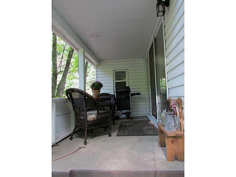 167 Poplar Street McKees Rocks, PA 15136 - Photo 12 of 22 Patio/Deck. Another view of the covered porch with access from the living room.