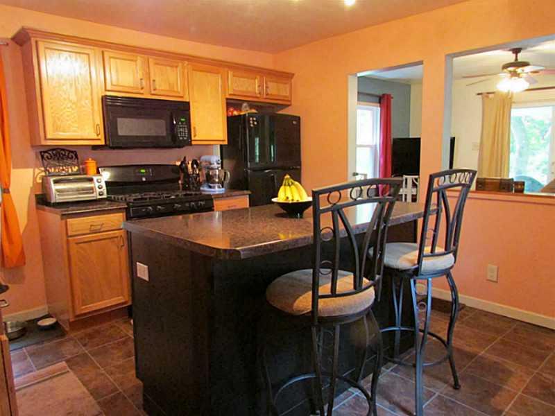 167 Poplar Street McKees Rocks, PA 15136 - Photo 16 of 22 Kitchen. The kitchen is open into the living room allowing you to prepare a meal while entertaining guests or interacting with your family.