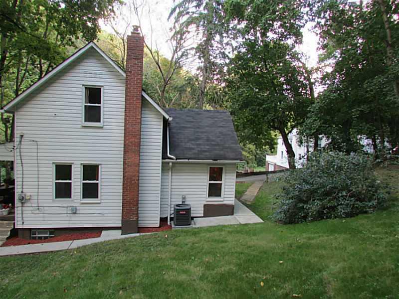 167 Poplar Street McKees Rocks, PA 15136 - Photo 20 of 22 Exterior Back. A view of the side of the house.