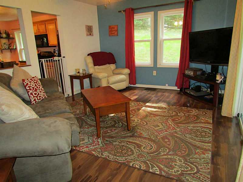 167 Poplar Street McKees Rocks, PA 15136 - Photo 4 of 22 Living Room. You can see the kitchen from this view of the living room