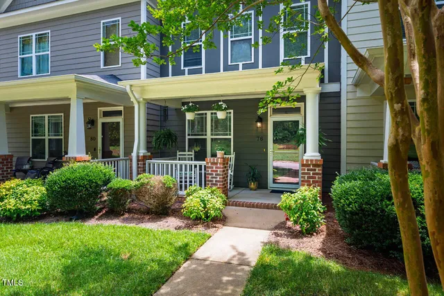 front view of a house with a small yard