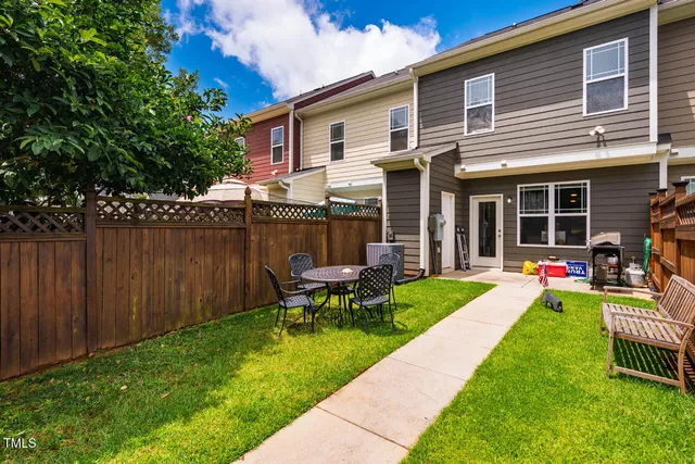 a view of a chairs and tables in the patio