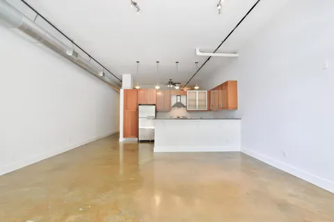 a view of a kitchen with a sink