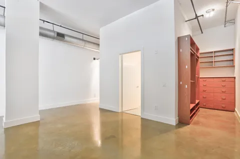 a view of a room with an empty space