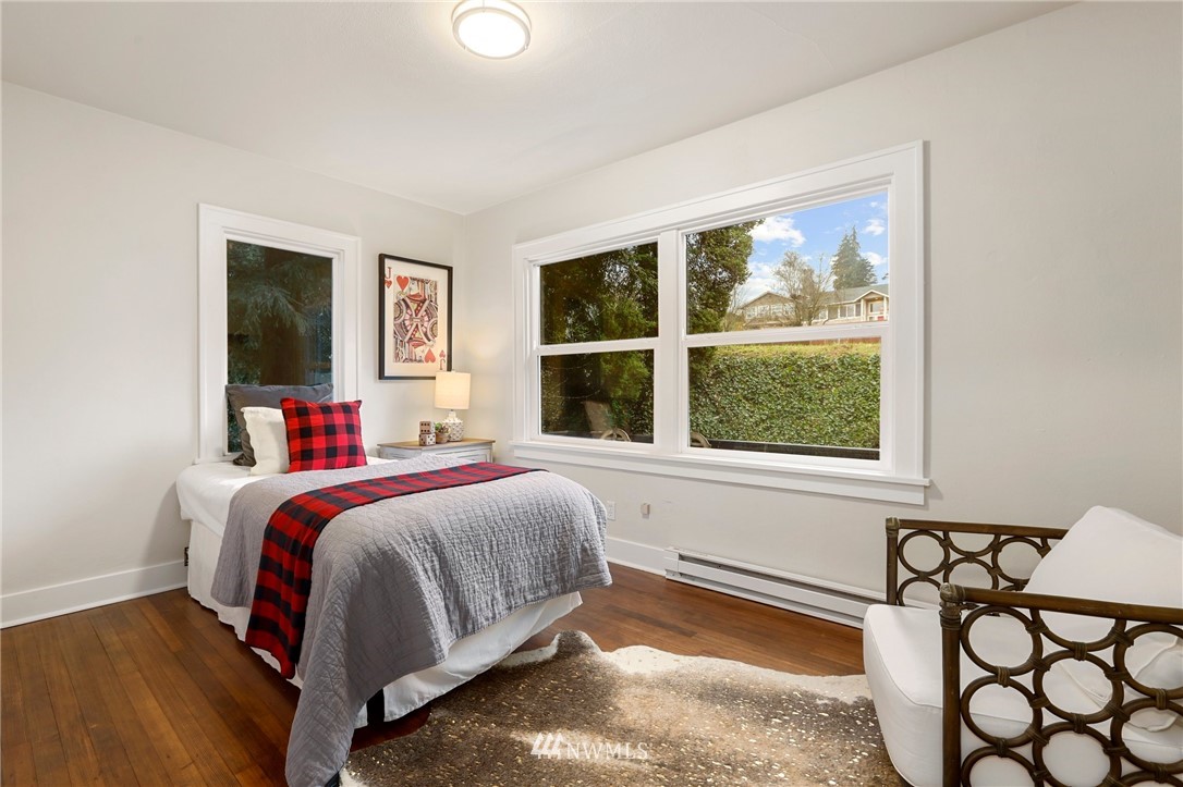 5431 Broadway Everett, WA 98203 - Photo 13 of 22 a bedroom with a bed and window