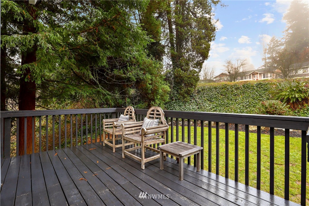 5431 Broadway Everett, WA 98203 - Photo 20 of 22 a view of a deck with two chairs and wooden floor