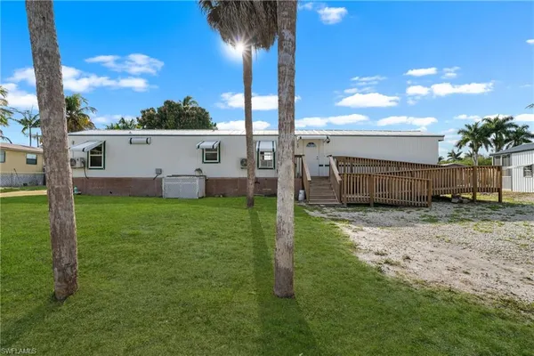 a view of backyard with green space