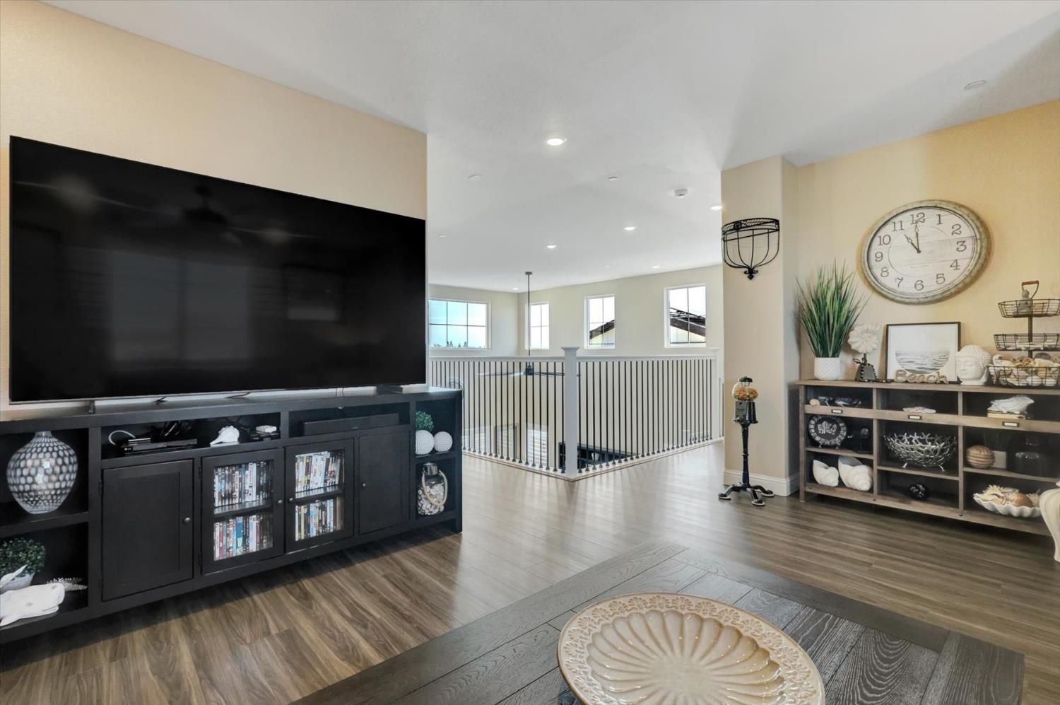 1104 Shadowgate Drive Roseville, CA 95747 - Photo 17 of 41 a living room with furniture and a flat screen tv
